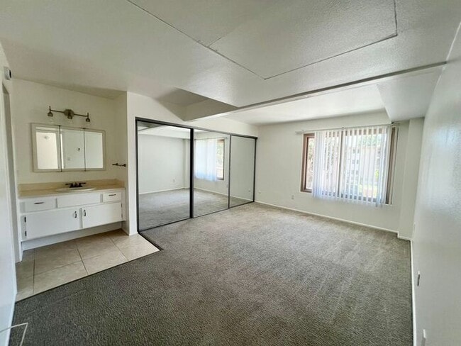 Photo - Spacious 2BR/1.5BA Townhome with A/C, Parking & Luxury Community Amenities