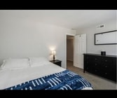 Second furnished bedroom, perfect for guests or a home office. - 940 Calla Ave Unit 8