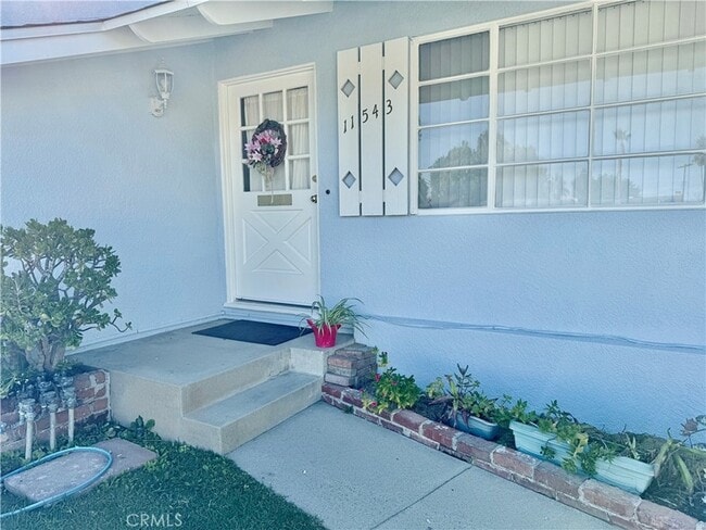 Photo - 11543 Swinton Ave