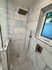 Custom shower with multiple shower heads - 7364 W 83rd St House
