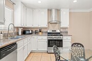 Photo - Fully Furnished 2BR Home with Crib — Mid-T...