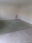 Very large living room, big windows - 2206 Graham Ave Apartments Unit B