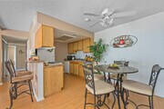 2BR, 2BA - 964SF - Dining Room - Newporter Apartments