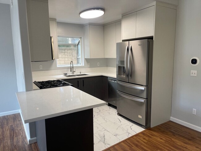 Updated Two Story Townhome w/ Two Car Garage - Updated Two Story Townhome w/ Two Car Garage