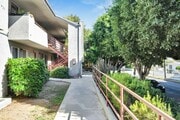 Walkway to unit - Pacific Apartments