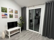 Living Room - night - 4555 Narrot St House Unit ADU - 4557
