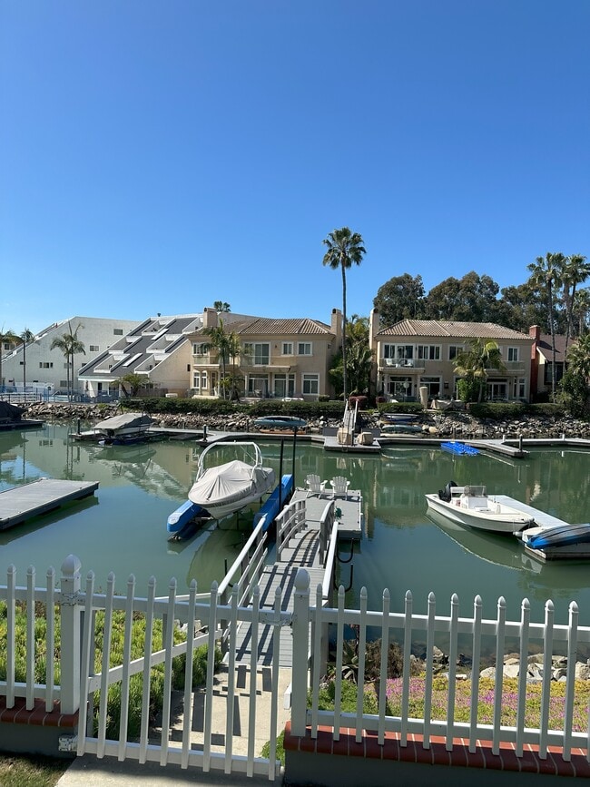 Boat dock in the backyard - 4659 Park Dr Unit A