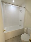 Bathtub/shower and toilet - 11959 Nebraska Ave Unit 101