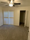Bedroom with walk in closet and new double pane sliding glass doors to private balcony/deck - 436 N Bellflower Blvd Unit 218