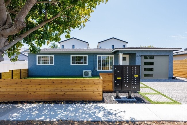 Building Photo - Welcome to your new home in the vibrant Ba...