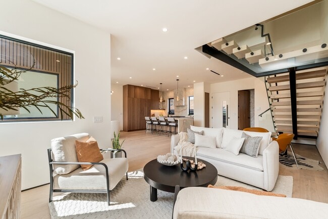 Cozy living room filled with natural light - 836 Waterloo St