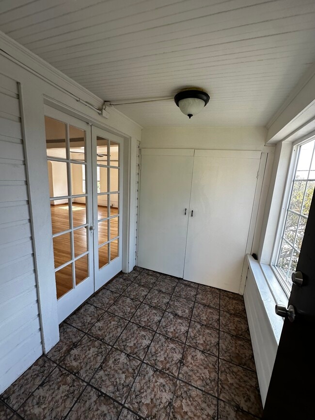 Entrance - Storage Closet & Double doors to Living Room Area - 1200 N Hoover St