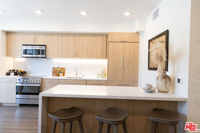 Building Photo - 7566 W Sunset Blvd Unit 409PH-E Rental