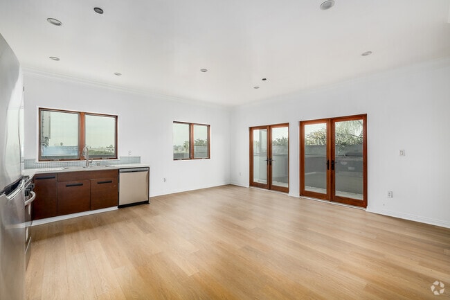 2BR, 2BA - 1,200SF - Living Room - 930 S Robertson Blvd