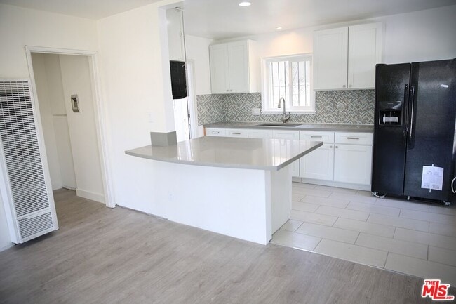 Building Photo - 1154 N Virgil Ave Unit #2