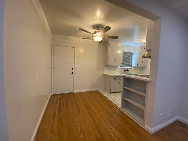 Adjacent Dining Room with book shelves - 700 S Louise St Unit 702