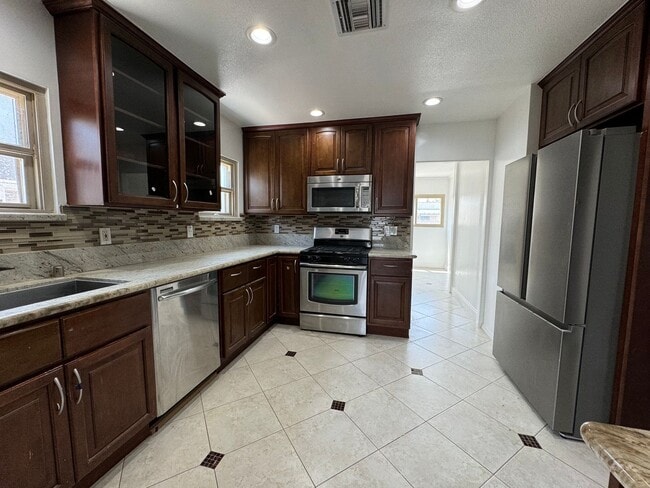 Photo - Charming Spanish-Style Home with a lot of ...