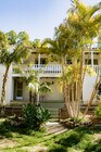First Floor shows private patio with unit entrance on the left side. - 9457 El Tejado Rd House