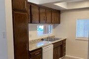 KITCHEN SMALL BAR AREA - Woodley Plaza Apartments