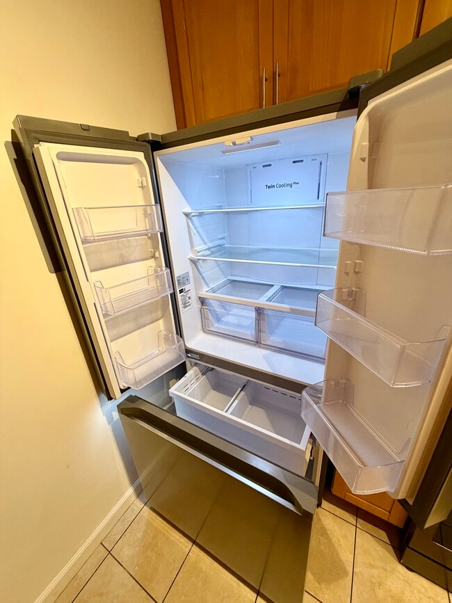 New fridge - 3045 E Theresa St Unit 8