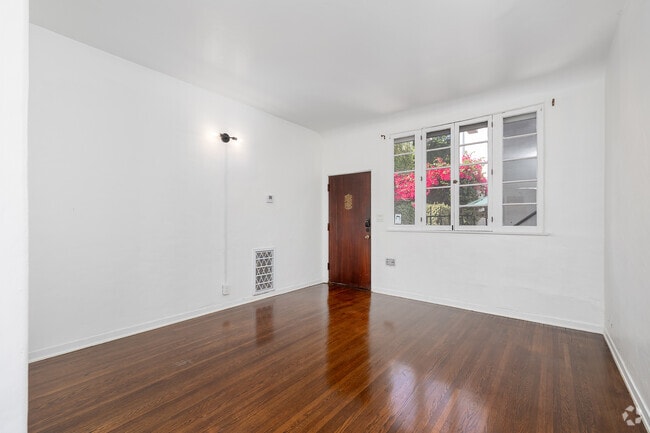 2BR, 1.5BA - 675SF - Living Room - 8214 Norton Ave