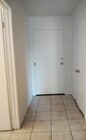 Entry hallway has a closet - 6815 Remmet Ave Condo Unit 209