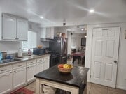 Laundy room next to the kitchen - 2001 Cloverfield Blvd House
