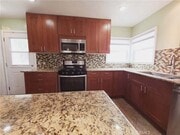 Photo - 6129 Myrtle Ave Apartment