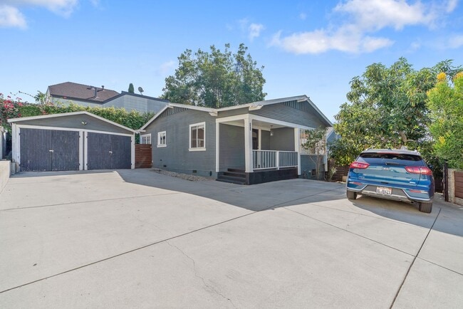 Building Photo - Stylish 2-Bedroom Retreat with Private Yar...