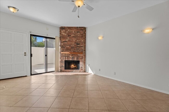 Photo - Light Filled Townhome Style Condo with Private Patios and Direct Access