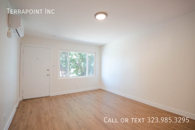 Building Photo - 825 W 167th St Unit 7