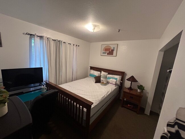 Freshly painted room with amenities - 1223 Helix St Townhome