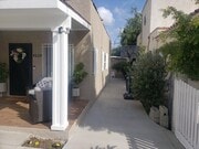 driveway down to the entrance of rear unit - 4229 Mandalay Dr Unit rear