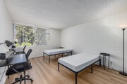 2BR, 2BA -unit 335-950 SF - Primary Bedroom - Mardi Gras Apartments