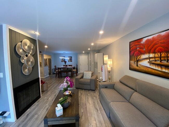 living room - 16866 Kingsbury St Condo Unit 115