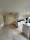 dining room with new modern ceiling fan - 1225 N Broadway Townhome