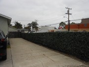 Driveway gated entry - 4421 W 169th St Apartments Unit B