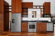 Stainless steel appliances and plenty of storage. - 4638 Del Monte Ave