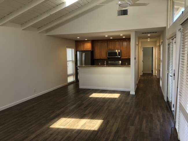 Living area to Kitchen - 518 Dahlia Ave Apartments Unit 518.5 Back