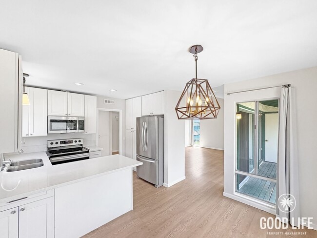 Photo - Bright 2BD/2BA Corner Unit Condo in Escondido with Reserved Parking, Quartz Kitchen & Private Bal... Unit 36