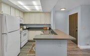 Photo - Turnkey ground floor condo in the coveted ...