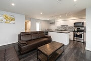 4BR, 3BA - 1,800SF - Living Room & Kitchen - Full 4BR Units + Co-Living Available