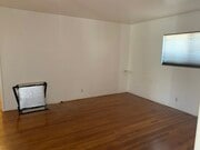 Living room - 2640 S Corning St Apartments Unit Front