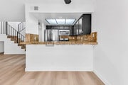 Photo - 15555 Nordhoff St Townhome