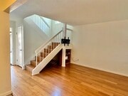 There is a storage closet under the stairs. Guest bath across the hallway from the stairs. - 9505 Easter Way Townhome