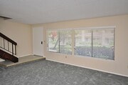 Photo - Bright Two-Story 3BR Condo with Spacious F...