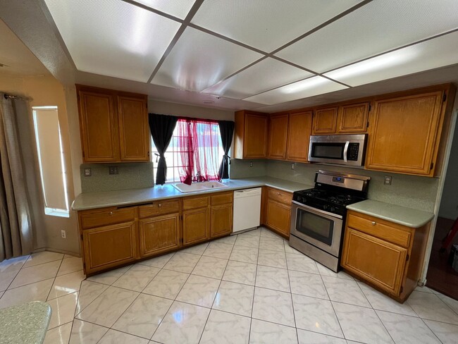 Photo - Spacious 4-Bedroom + Office Home in Desirable HOA Community Near New Shopping & Costco