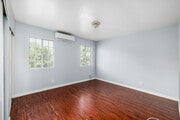 2BR, 1.5BA - 1,200SF - Primary Bedroom - Sunflower Norton Apartments