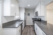 2BR, 2BA - 1,000SF - Kitchen - La Pat Courtyard Apartments