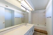 1BR, 2BA - 1,150SF - Bathroom - Canyon Villas Place